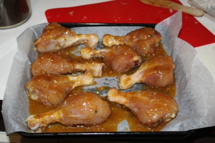 drumsticks with skin removed and covered in glaze of apricot preserves, garlic, sage, lemon zest and juice, worcestershire sauce, and s&p